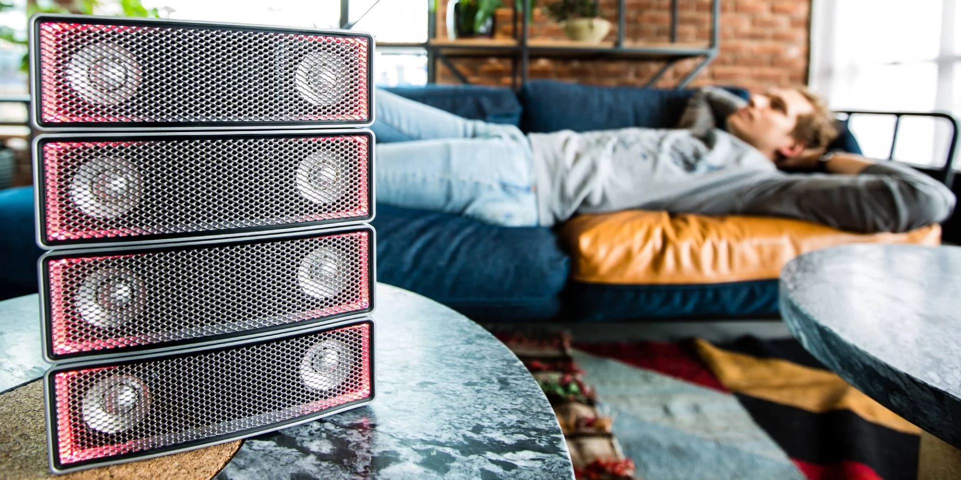 Ai-2 portable speaker units wirelessly connect to each other using optical communication tech and some AI smarts
