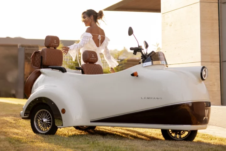 The Lámpago three-wheeled electric micro-car/scooter has plush seating for two, can motor to 25 km/h and has a per-charge range of up to 50 km