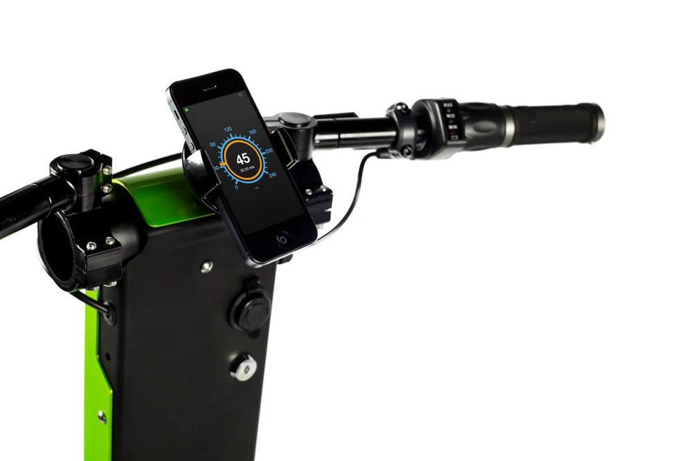 The handlebar sports a smartphone cradle that can also charge the docked device via USB