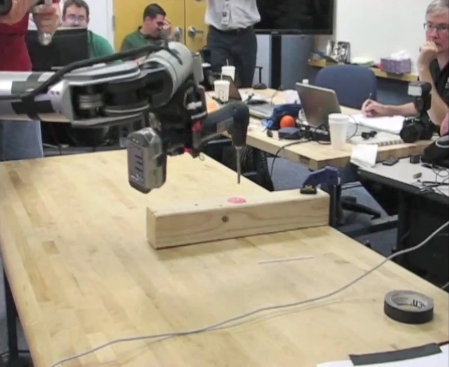 DARPA's ARM program hand picks up and operates a power tool