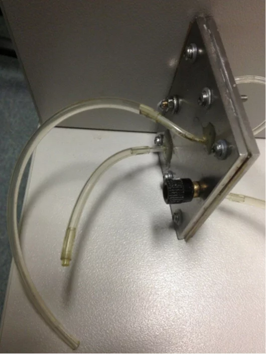 The experimental preliminary proof of concept proton flow battery system that measures 65 x 65 x 9 mm (Photo: RMIT)