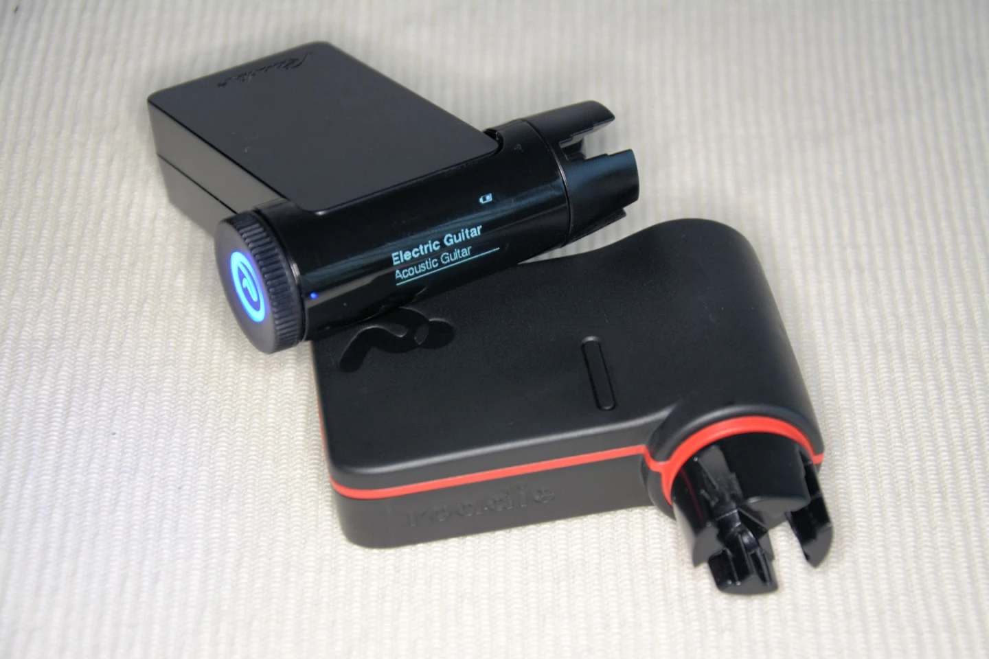 The Roadie 2 (back) is has an OLED display up top, a power on button that's part of a click wheel and can tune up an instrument without needing to be paired to a smartphone running a companion app