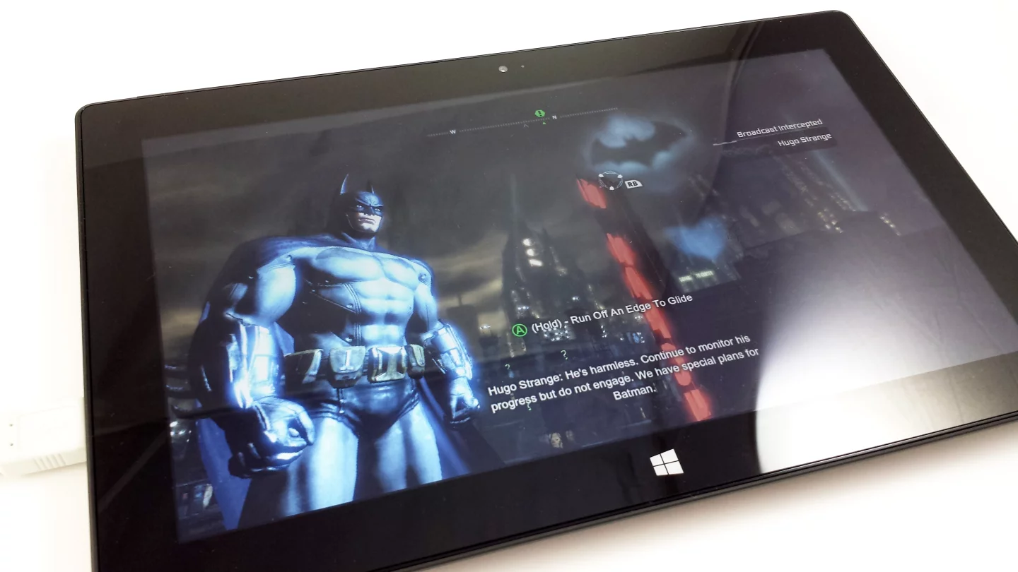 Batman: Arkham City played extremely well ... once I turned down the resolution and detail settings