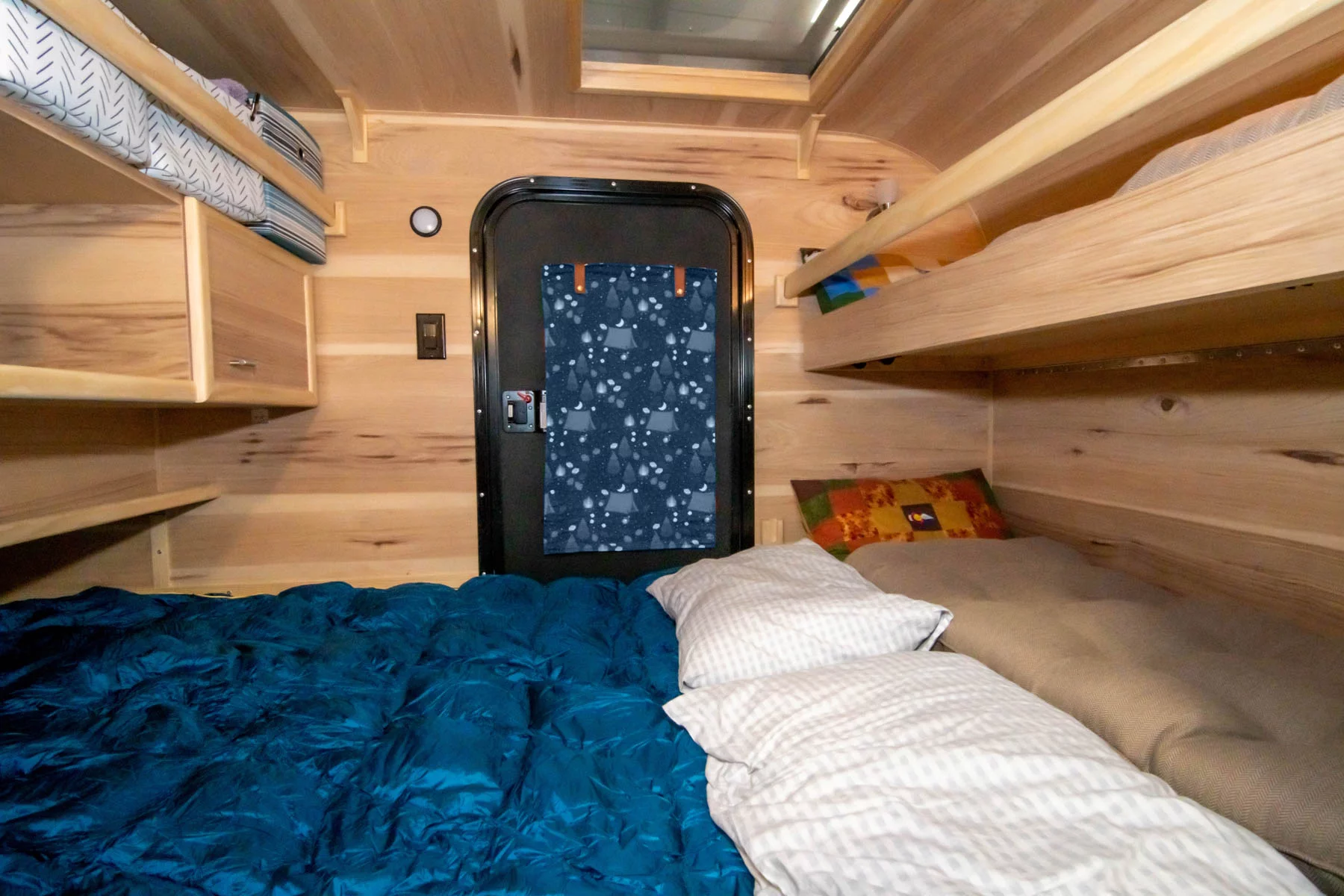 The Mt. Massive and EC-4 include a queen bed and available dual bunks to sleep up to four people