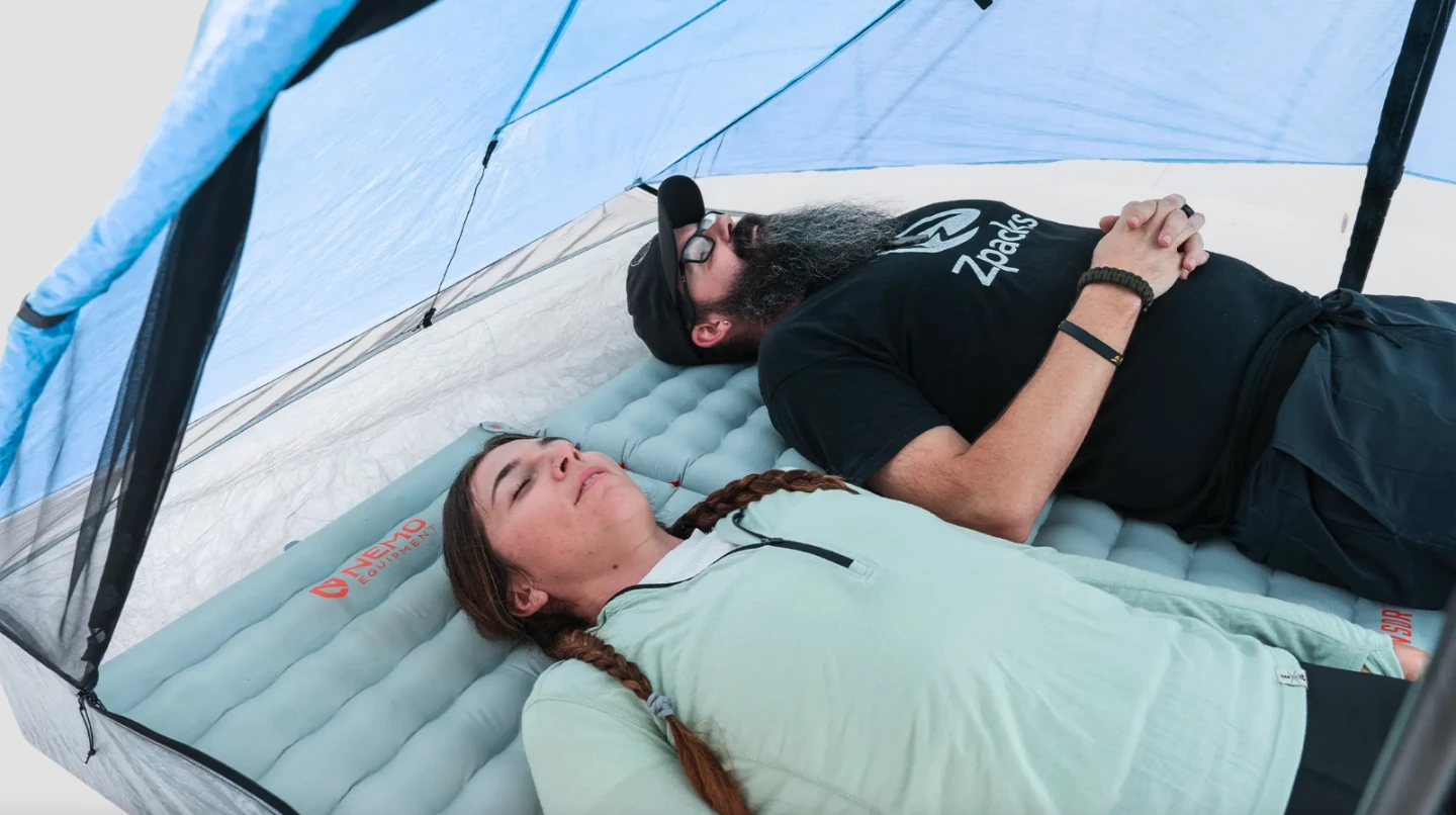 The rectangular 50-in-wide floor provides enough space for two people sleeping on 25-in-wide pads to sleep on either end
