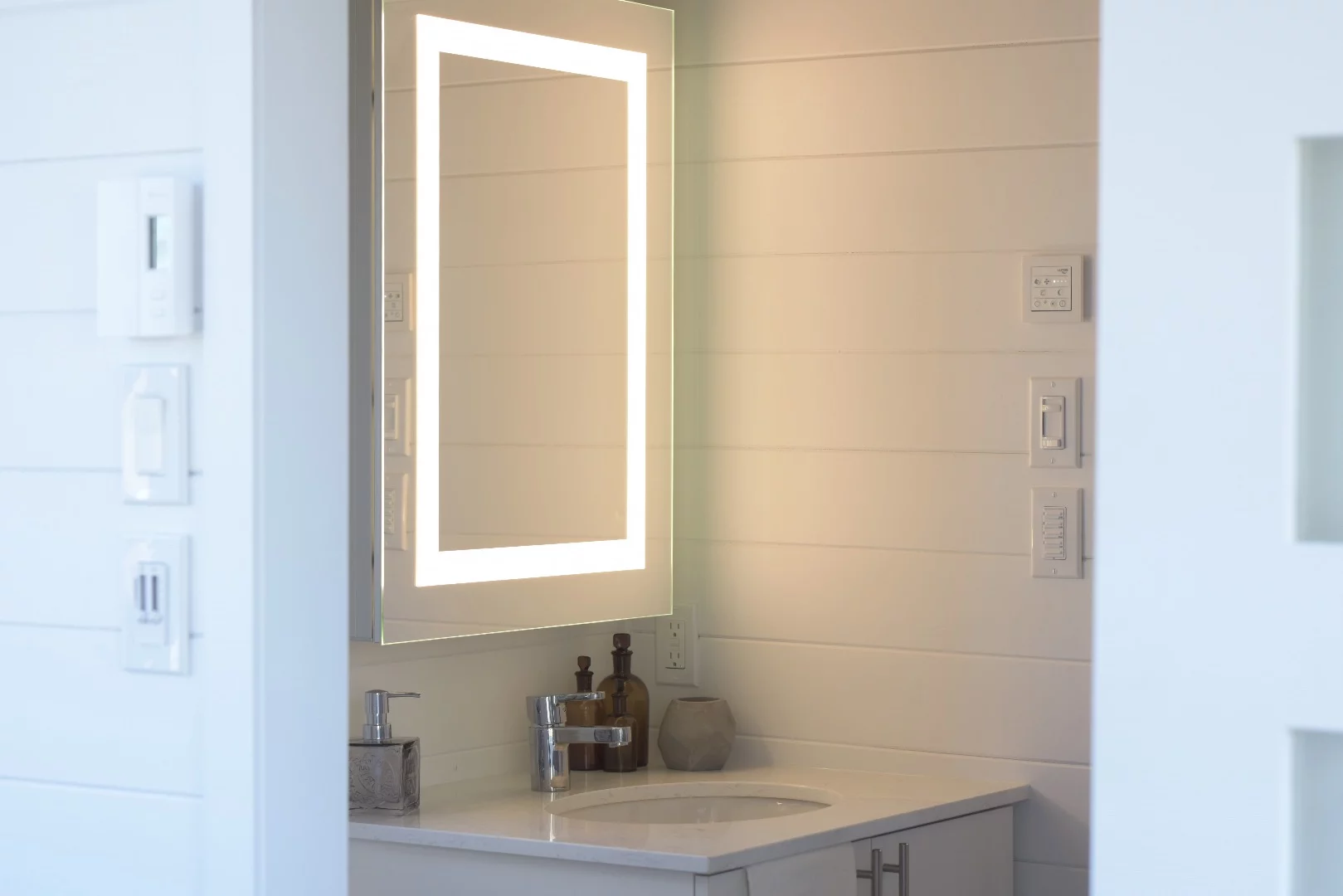 The Magnolia's bathroom includes a custom vanity unit