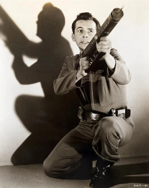 Production still showing the blaster rifle in action