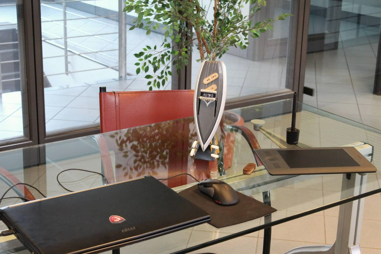 The Astro ukulele can serve as attractive desk candy when not in use