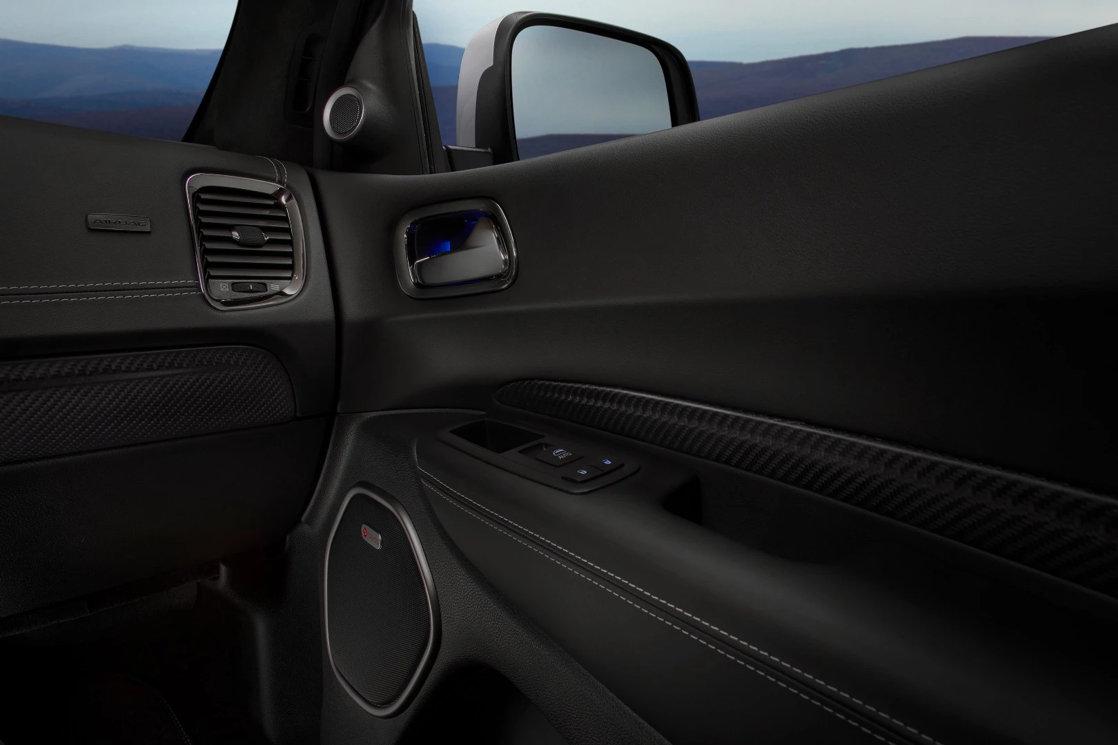 Dodge offers carbon fiber trim on the doors and instrument panel