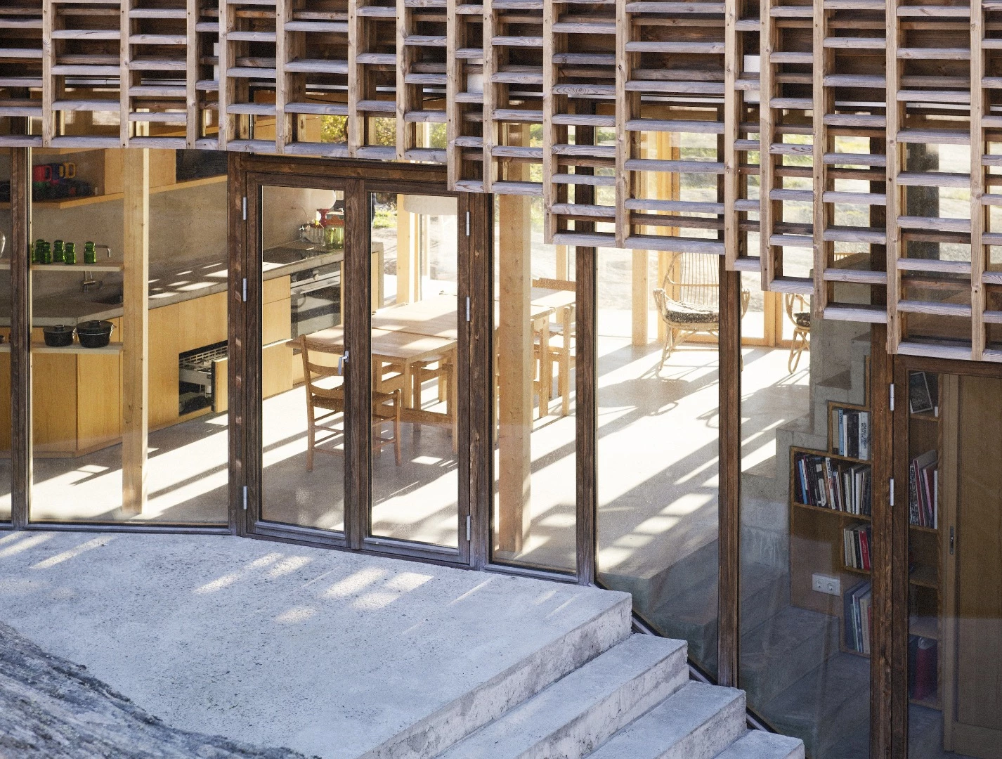 House on an Island's timber lattice is made from Kebony, a manufactured wood product that's meant to turn grey over time but will require no maintenance
