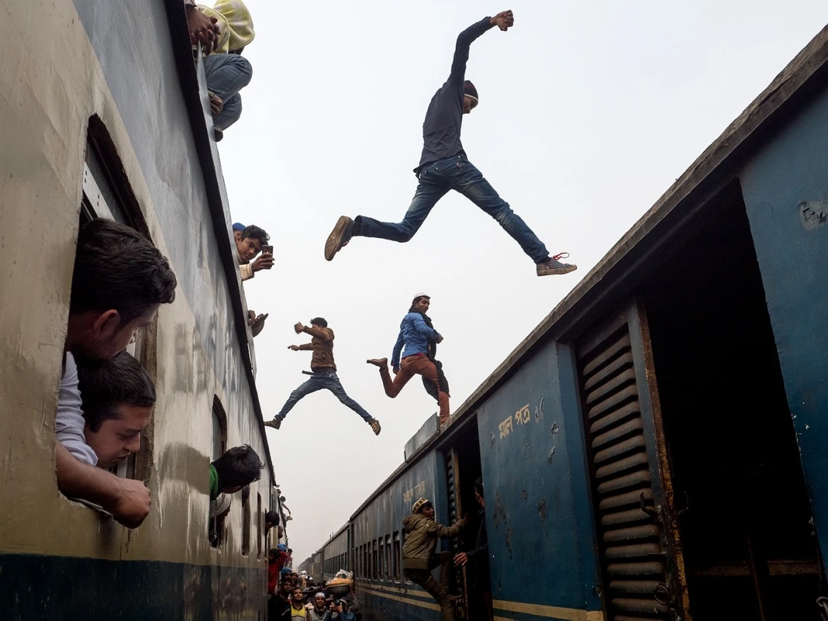 Marcel Rebro: Train jumpers - 1st Place in Photojournalism, Amateur
