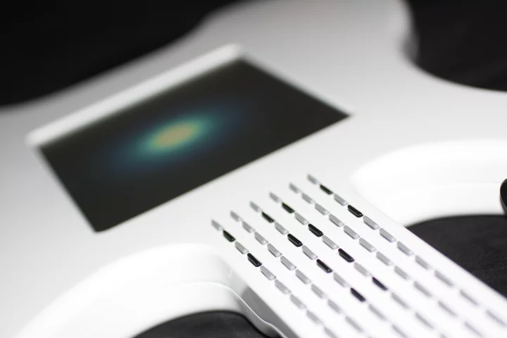 Each 'keycap' represents a note, similar to fret positions on a traditional guitar but the sound of each one can be varied according to user preference