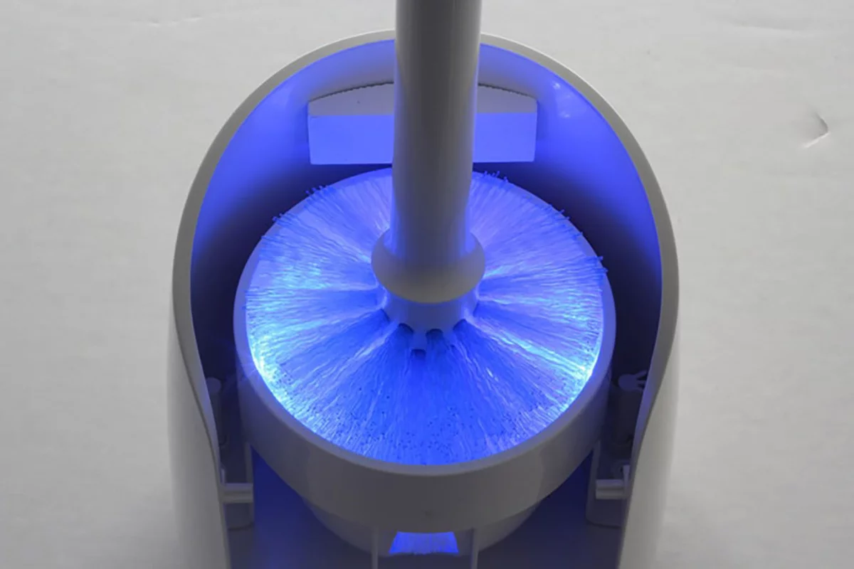 UV lights from all sides blast and sanitize the Lumi toilet brush after use