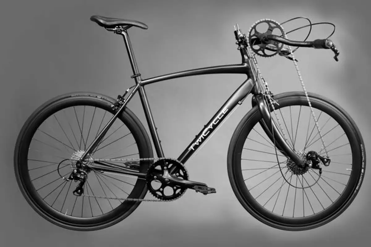 The TwiCycle has a chain running directly from the revolving handlebars to a derailleur and cassette mounted on the front wheel