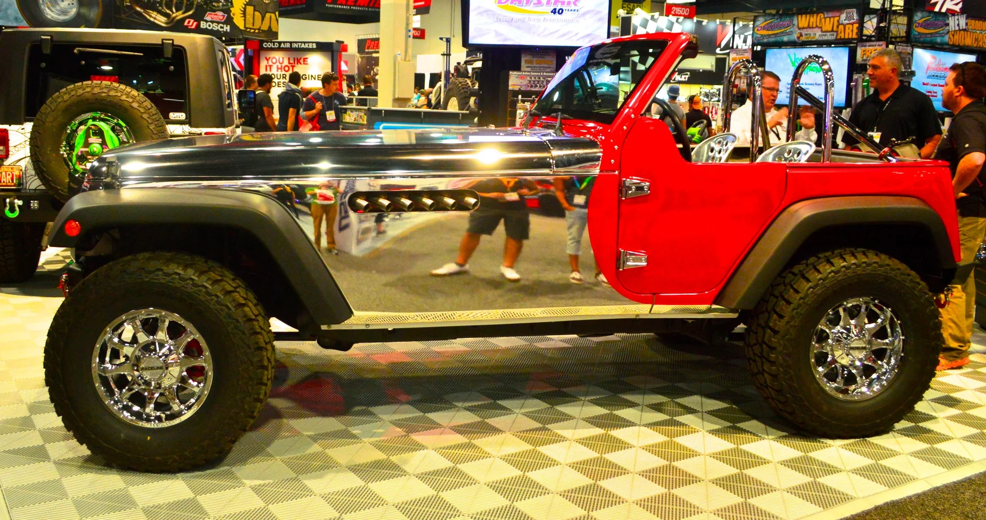 This photo gives a better idea of how Daystar stretched the Jeep Wrangler to fit all twelve cylinders below the hood
