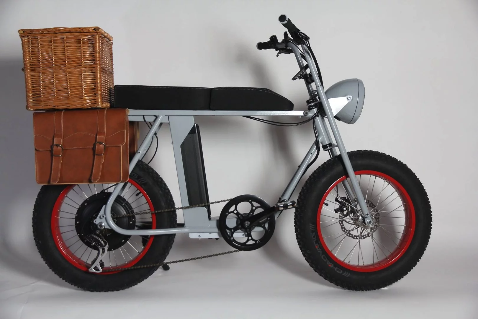 Pop the back seat cushion of the Moke e-bike off and replace it with a cargo basket or rack