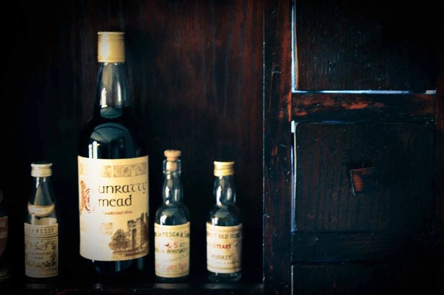 Oak and pine wood has been distressed and stained to lend an aged appearance