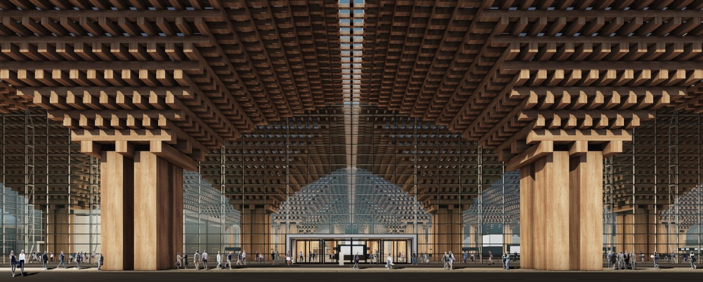 Suvarnabhumi International Passenger Terminal II's facade is defined by large wooden columns and an upside-down pyramid motif