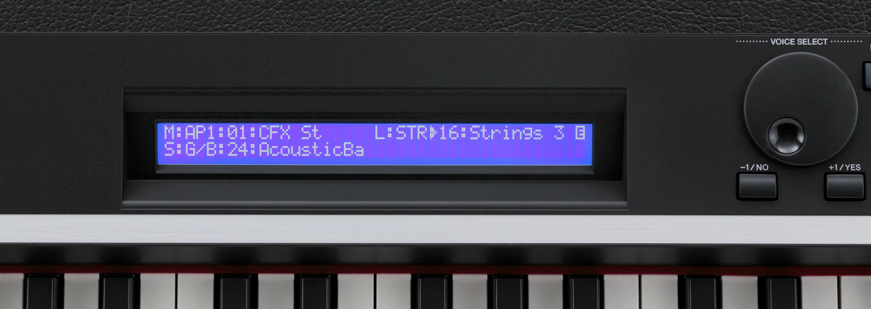 A two line, 40-character backlit LCD display panel sits at the center of the user interface