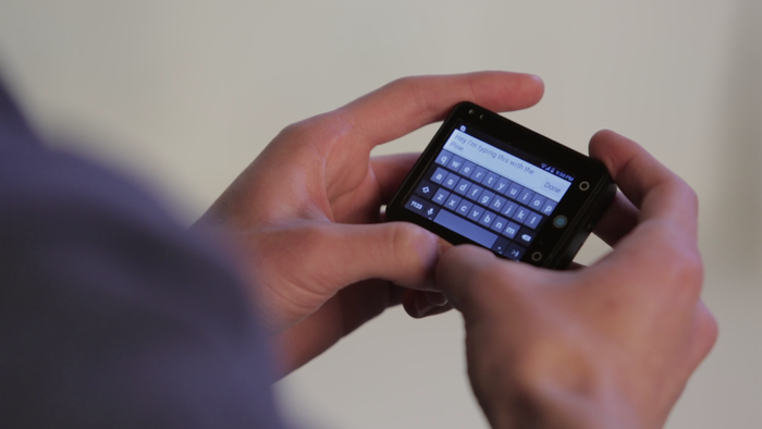 The Pine removes from the strap for two-thumb typing