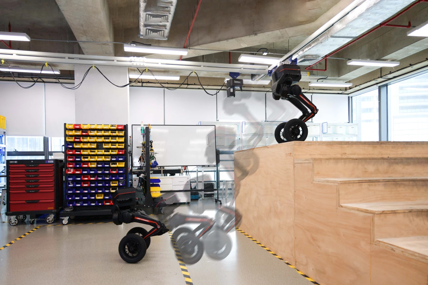Even with its fast-rolling Wheeled foot-end installed, the Tron 1 can still climb stairs then jump to the ground