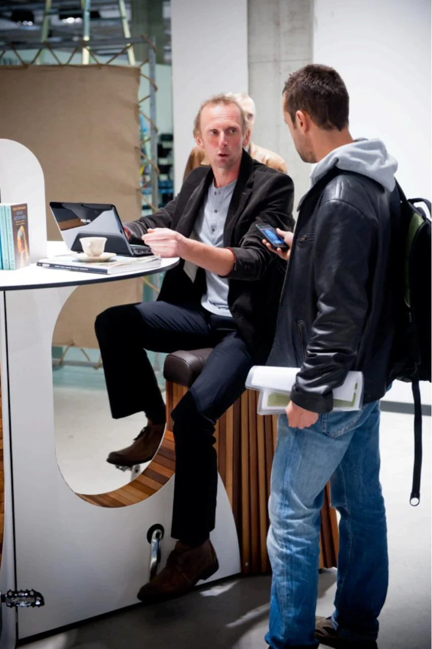 There's an interactive LED ring display in front of each seat which indicates the amount of human power being generated and the available AC power for charging devices
