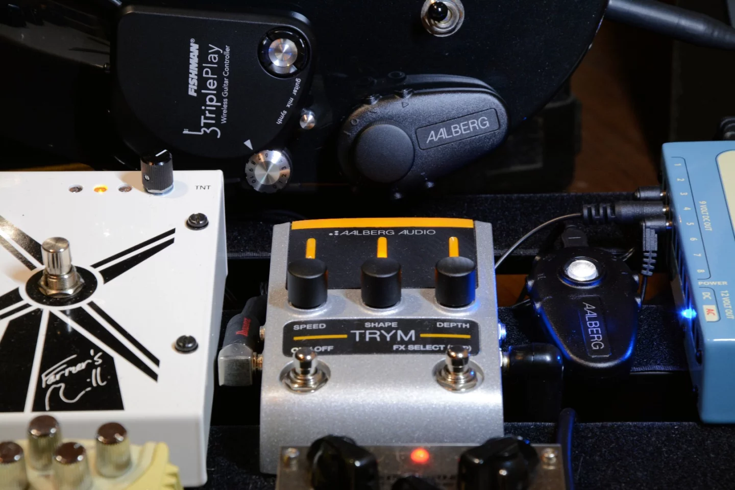 The Trym sat next to the Farmer's Mill on our pedalboard, and the Moon plugged into our old Vox stage amp - both under the control of the Aero attached to our test laboratory guitar
