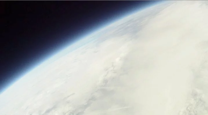 An image of the earth and the blackness of outer space, obtained by Luke and Max Geissbuhler