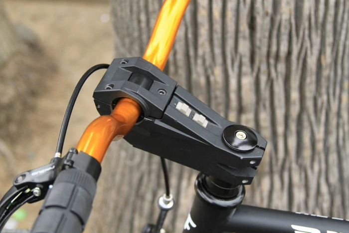 Users power the light up and select modes via two water-resistant switches on the top of the stem