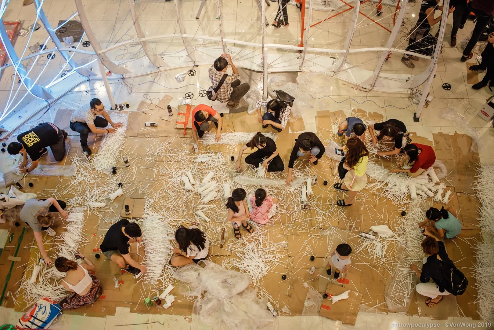 Volunteers during the construction of the Strawpocalypse installation