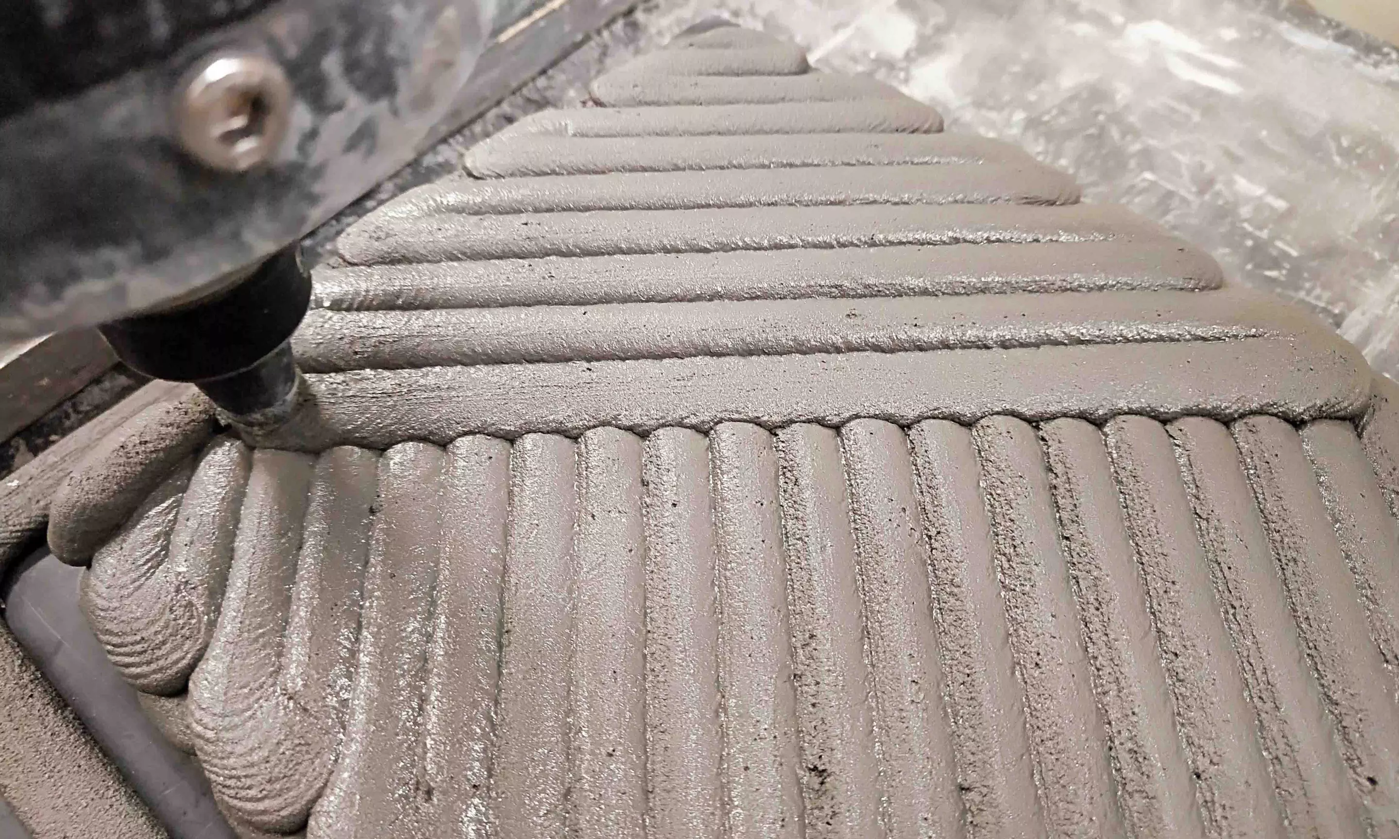 Scientists have found that a pattern inspired by the curved nature of lobster shells could lead to stronger 3D-printed concrete structures