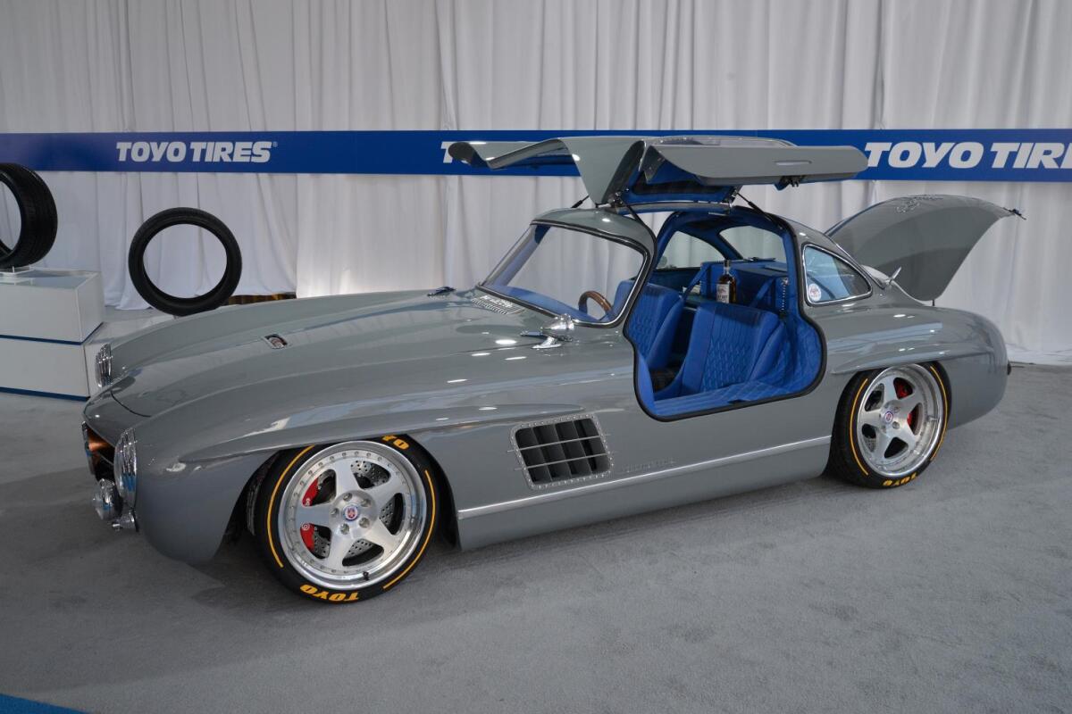 What looks like a simple classic Mercedes-Benz 300 SL is actually a 1955 gullwing body atop a modern SLK32 chassis