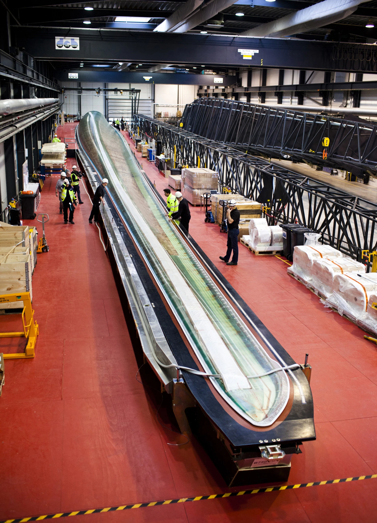 Remarkably, the 75-meter-long (246-ft) blades consist of a single component made from epoxy resin and balsa reinforced with glass fiber