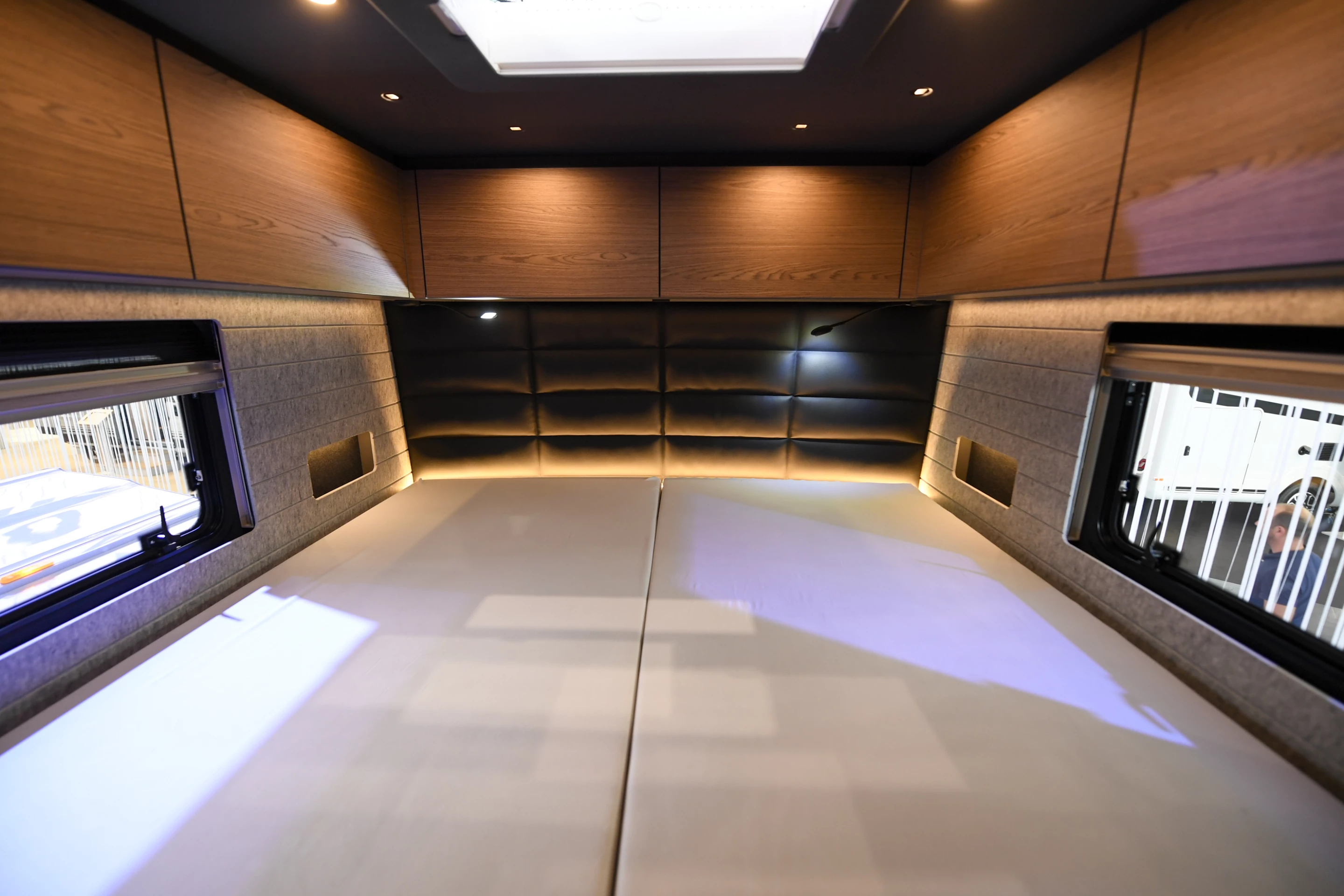 The cozy rear bedroom has a large double bed, soft-touch materials throughout and plenty of storage space