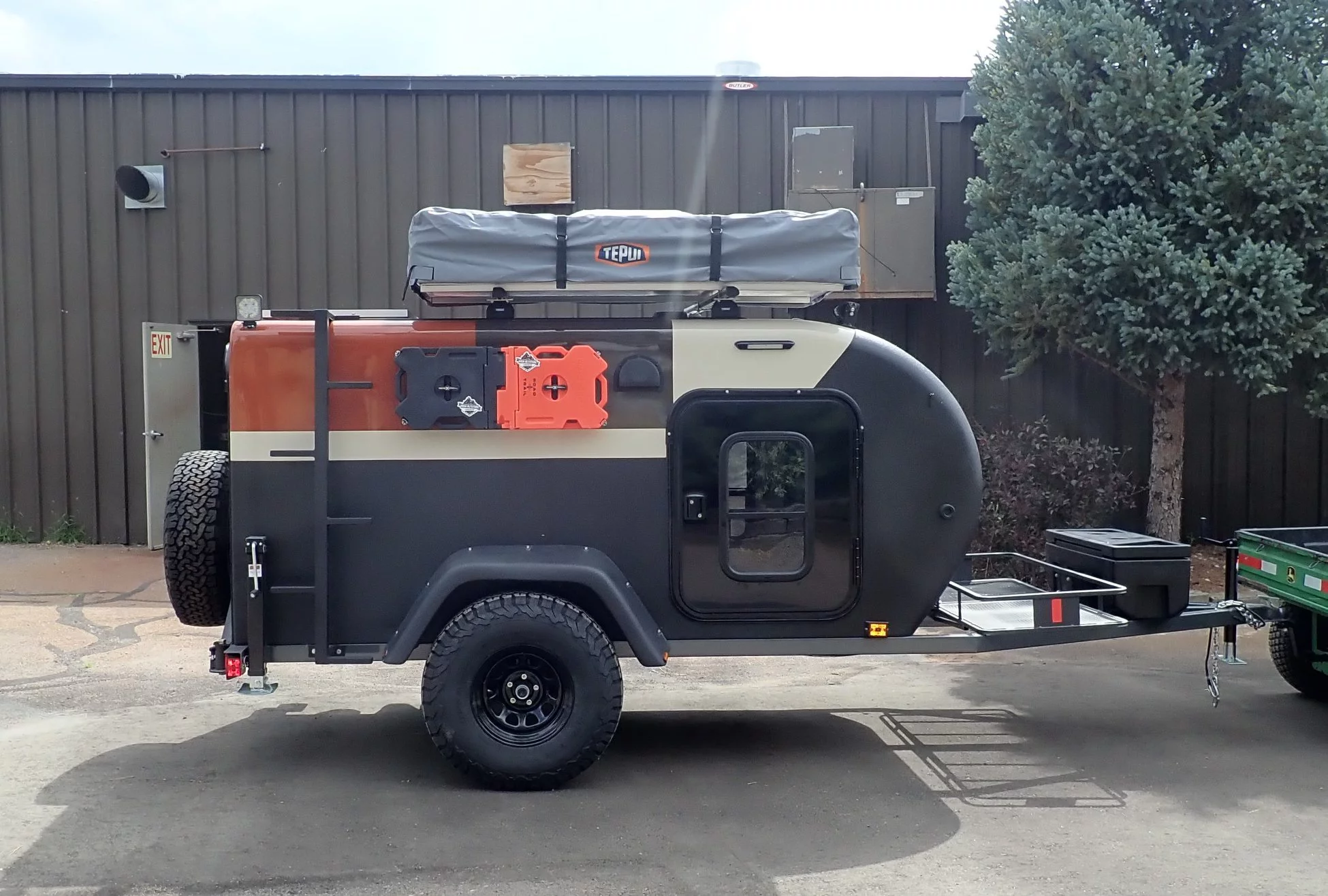 High Altitude offers a variety of options and accessories, including awnings, tents and Rotopax canisters