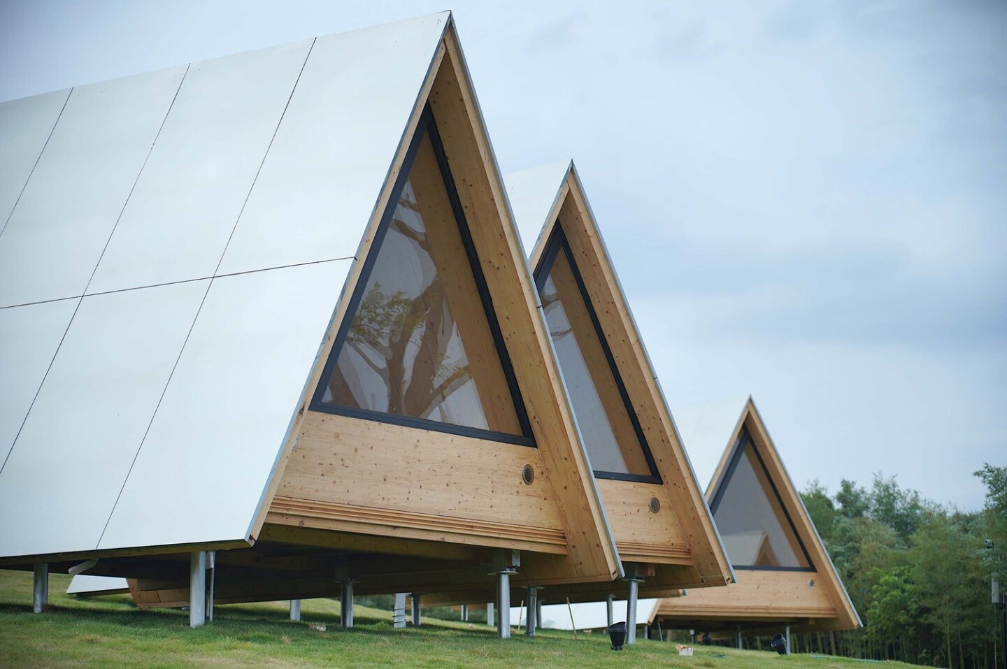 The more advanced A-frame cabins are supported by a series of steel anchors
