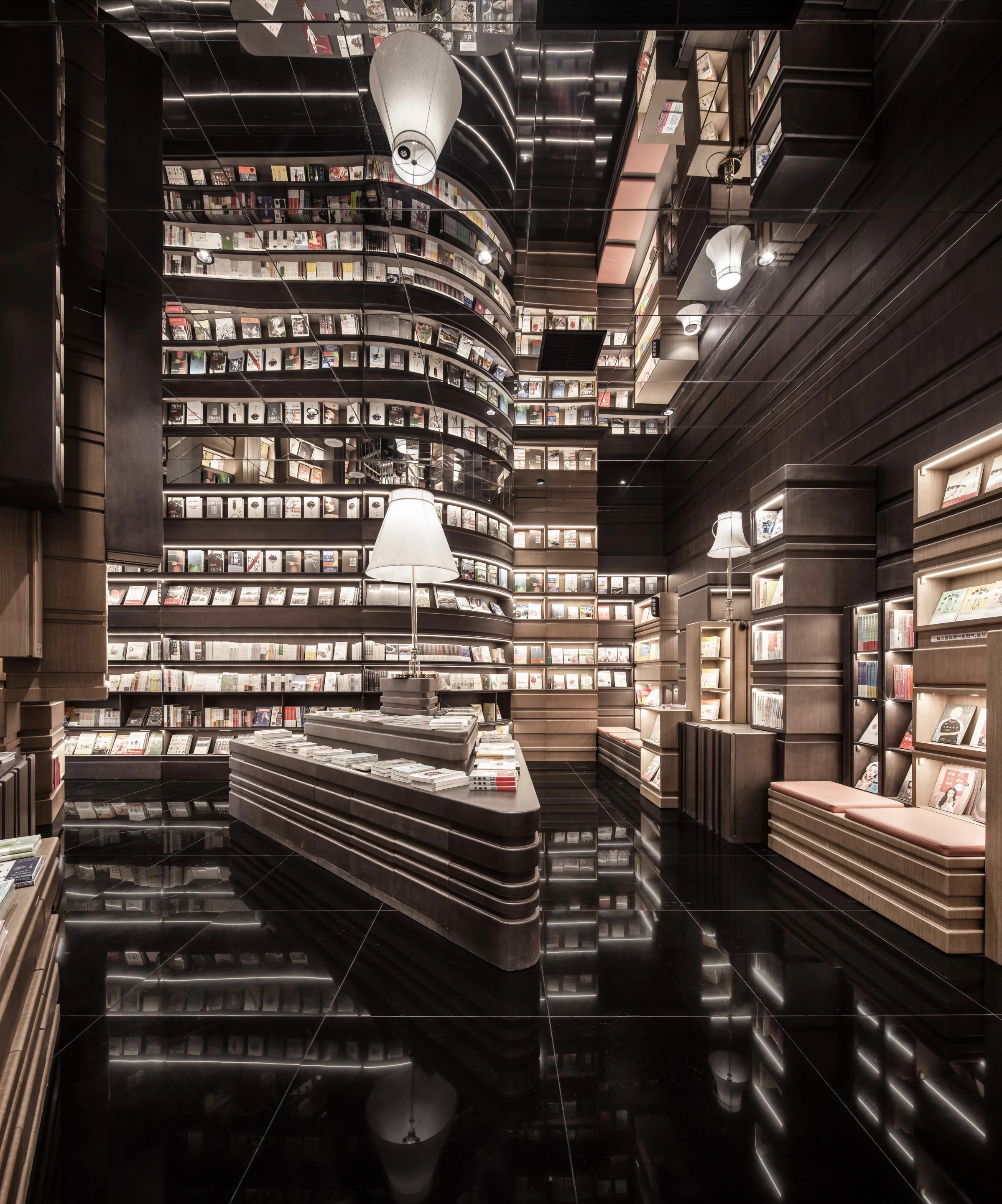 Walnut and black create an elegant feel inside the Zhongshuge bookstore in Ningbo, China