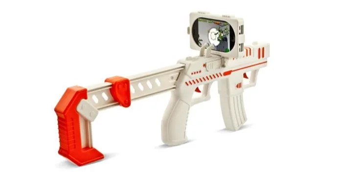 The appBlaster is an iPhone accessory that allows you to shoot at virtual aliens in your real-life surroundings, via the Alien Attack augmented reality app(Photo: RED5)