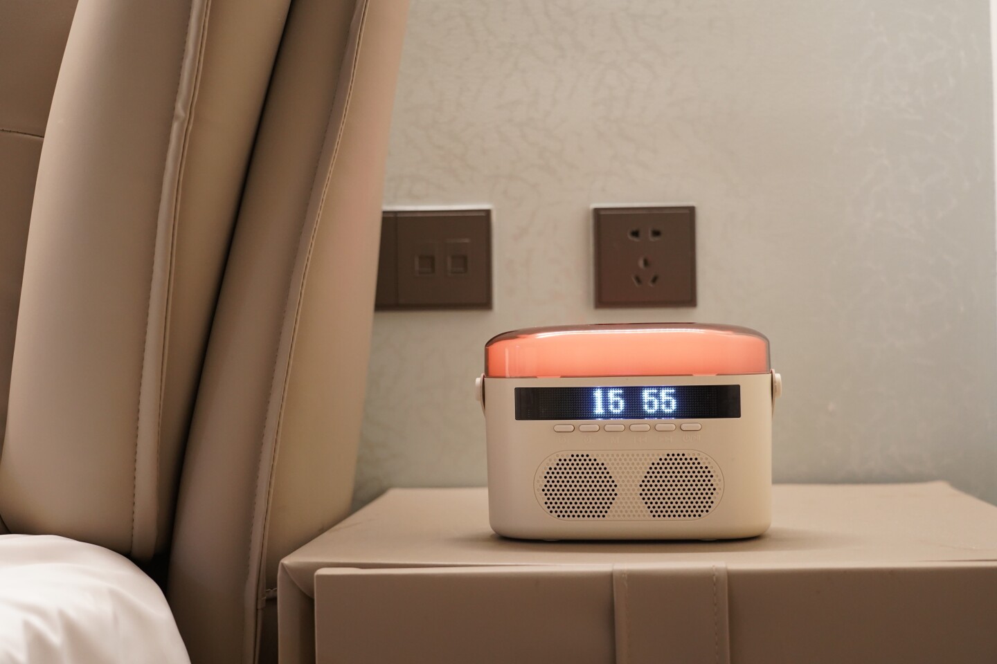 When not in use, it doubles as an alarm clock