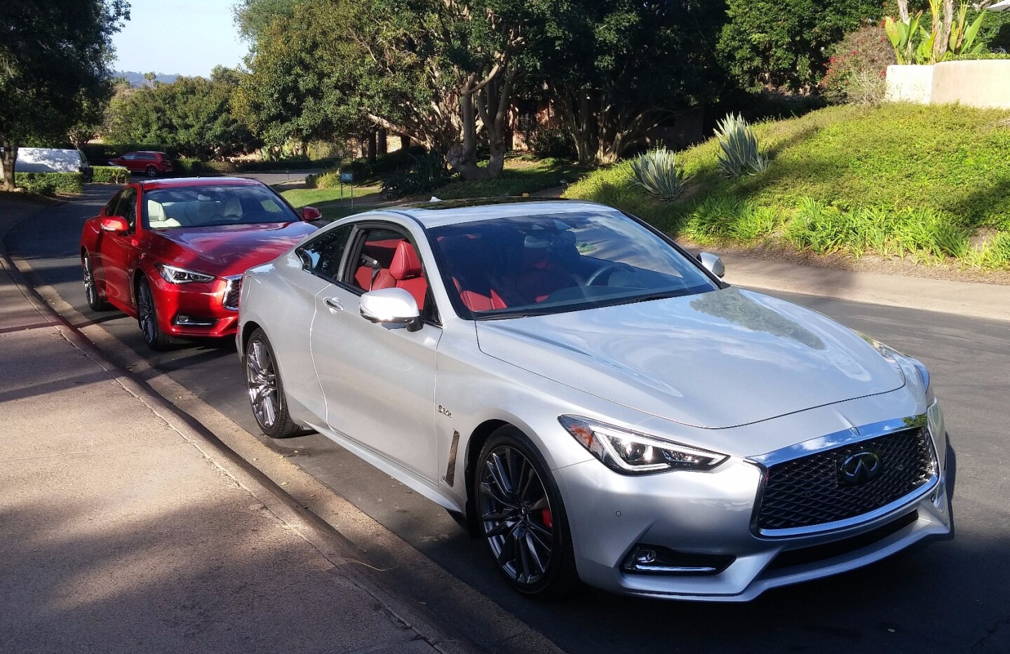 Our first drive for the day was the 2017 Infiniti Q60 in Liquid Platinum (foreground)