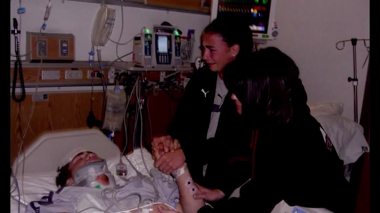Grief-stricken family members visit Godfrey in hospital after the accident