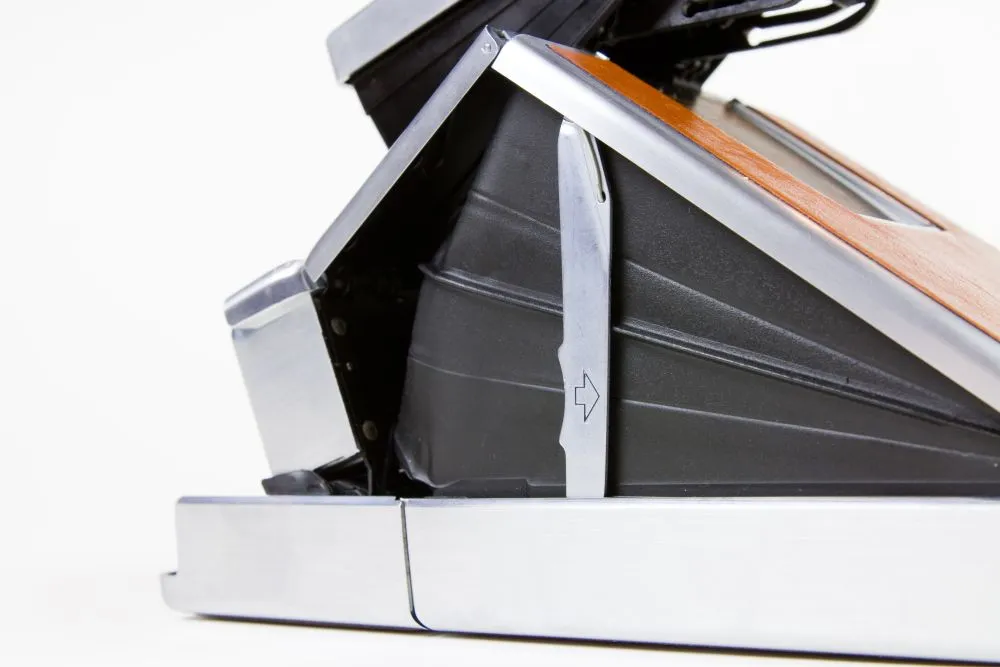 Each Polaroid SX-70 is "completely restored and hand-inspected, so it's guaranteed to be in tip-top instant photo taking shape"