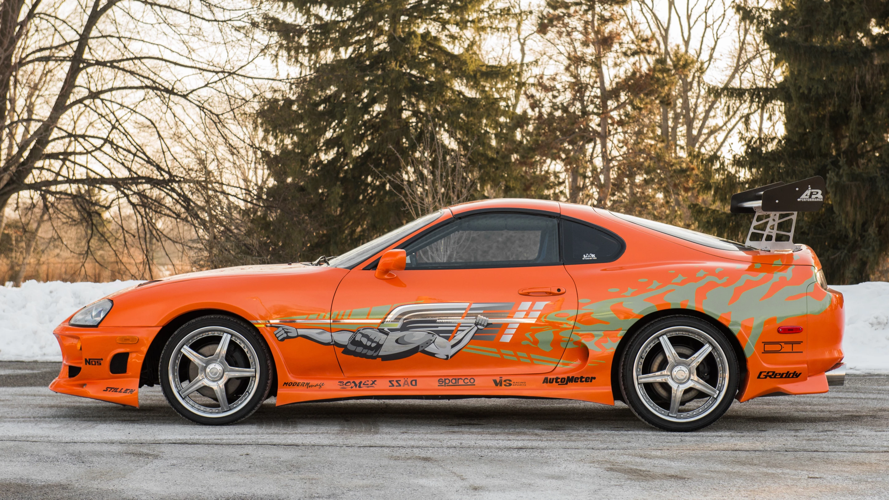 This car just might be one that surprises as the recently deceased Paul Walker is the posthumous star of Furious 7, a movie that has just been released and is smashing box office records willy nilly. The car is the iconic orange Toyota Supra driven by Walker in The Fast and The Furious (2001), is expected to fetch $150,000 to $200,000 but ... anything could happen on the day.