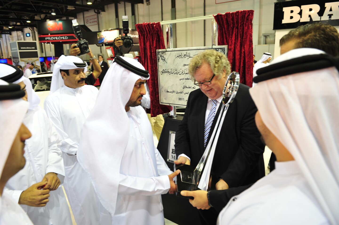 His Highness Sheikh Maktoum bin Mohammed bin Rashid Al Maktoum at the Brabus stand during the 2011 Dubai International Motor Show