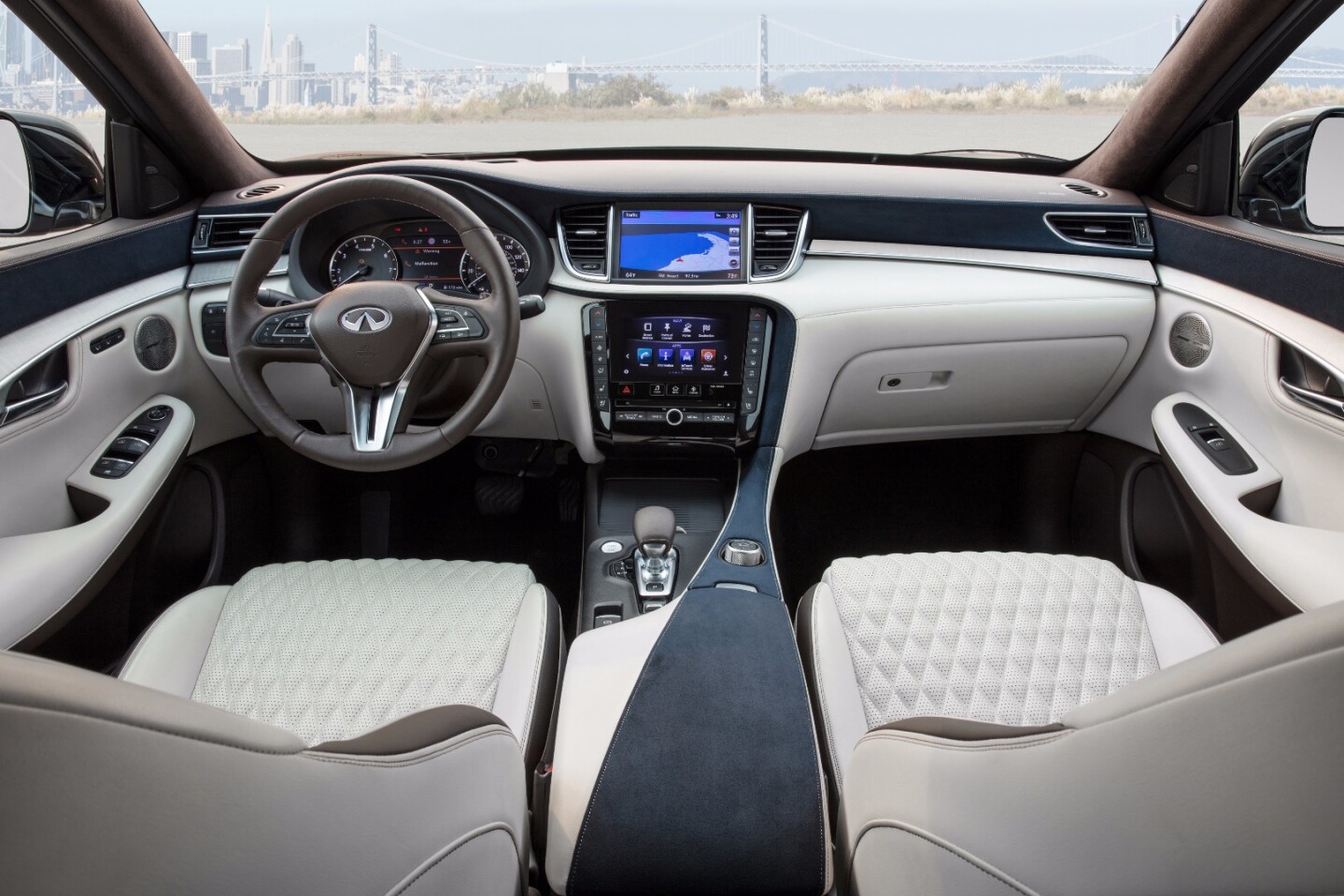 Infiniti has cleaned up the center console through the use of dual touchscreen displays for its InTouch infotainment system