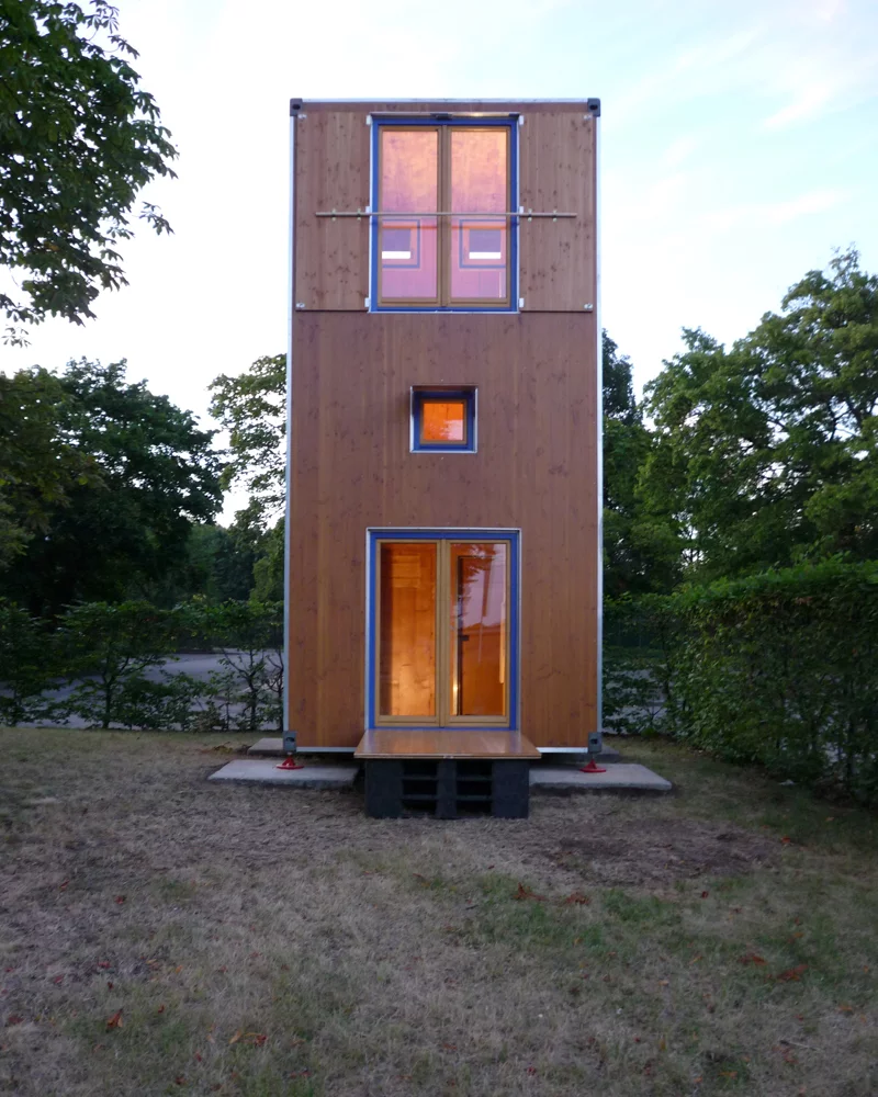 The compact home is spread across three levels, all of equal height
