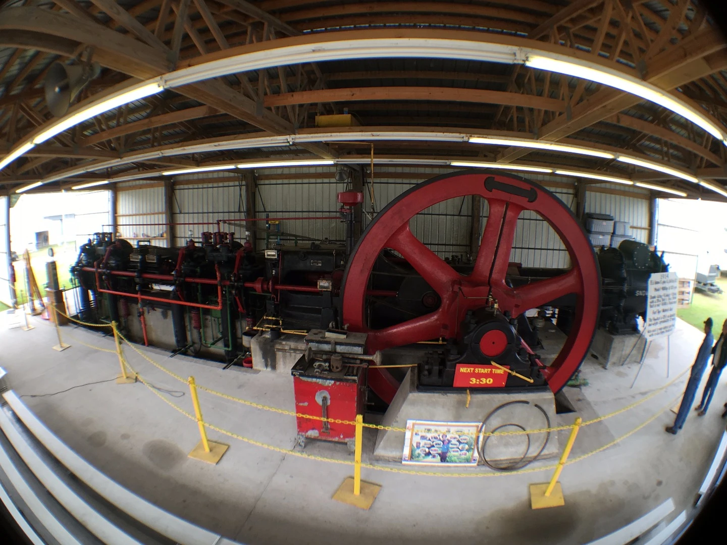 The Mother of all flywheels: This running 1914 engine features a 12 ton flywheel 12 feet in diameter. It made 400 horsepower at 120 rpm and was used to pump natural gas (which was also its fuel type) from the wells to the gas supply businesses. How big is it you ask? A mere 40,000 c.i.