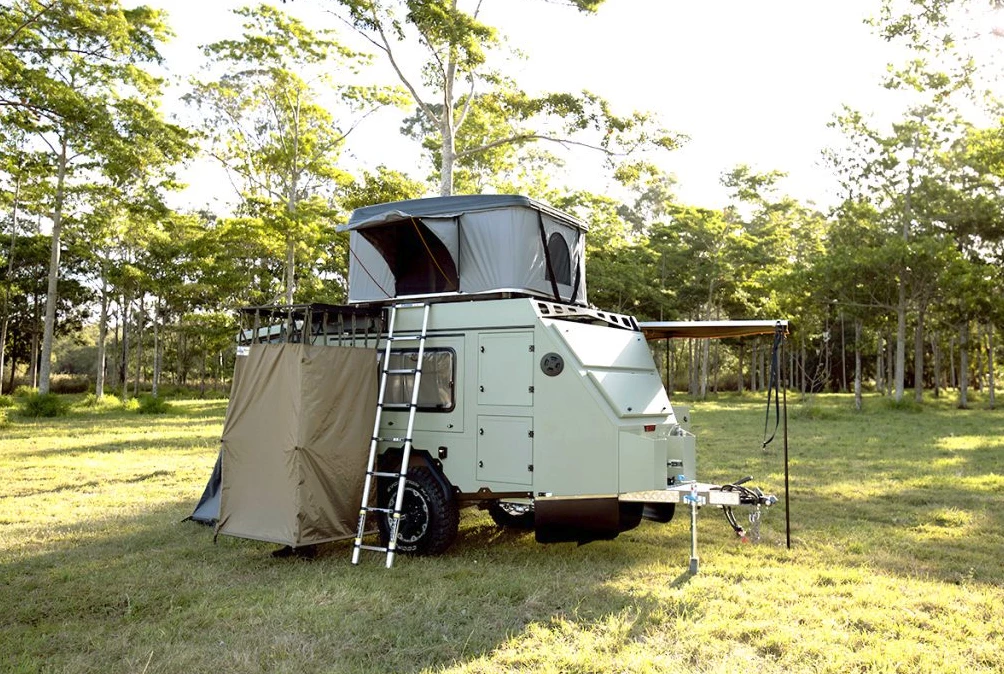 The shower pod deployed and roof-top tent opened