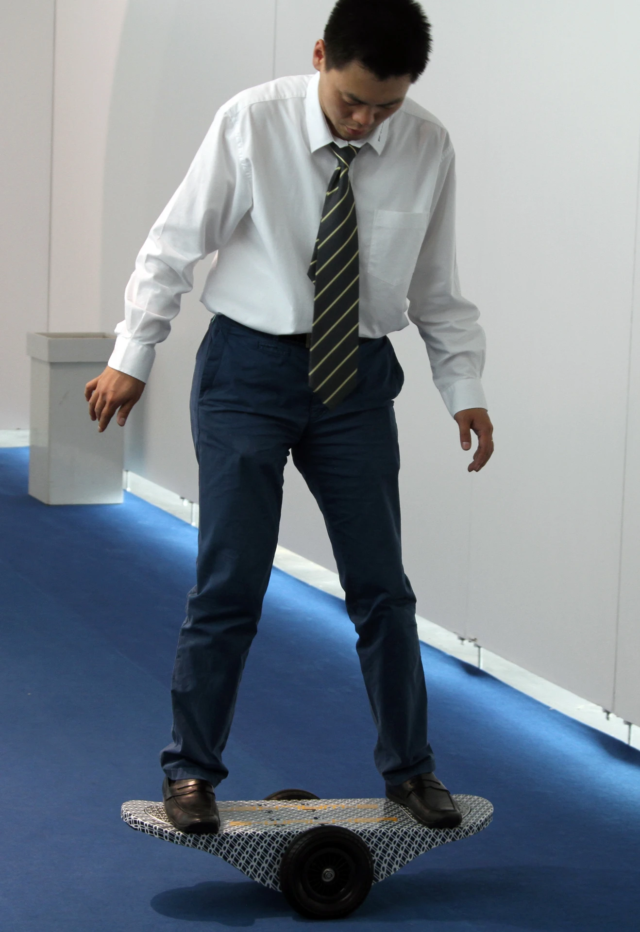 Cruising the halls on the S-Walker Board at IAA 2013
