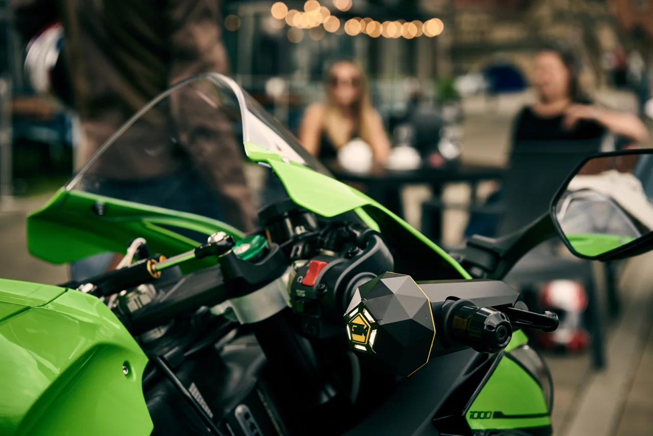 The Limpet's motorcycle mount disables the throttle and brake lever